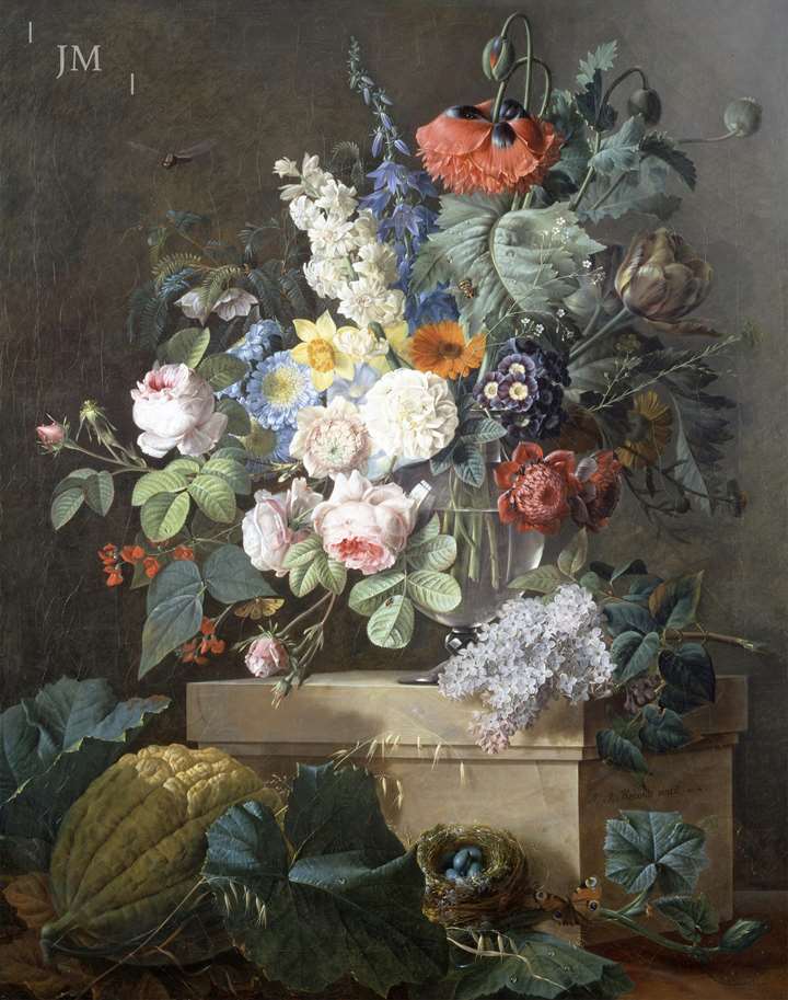 A bouquet of flowers on a marble entablature